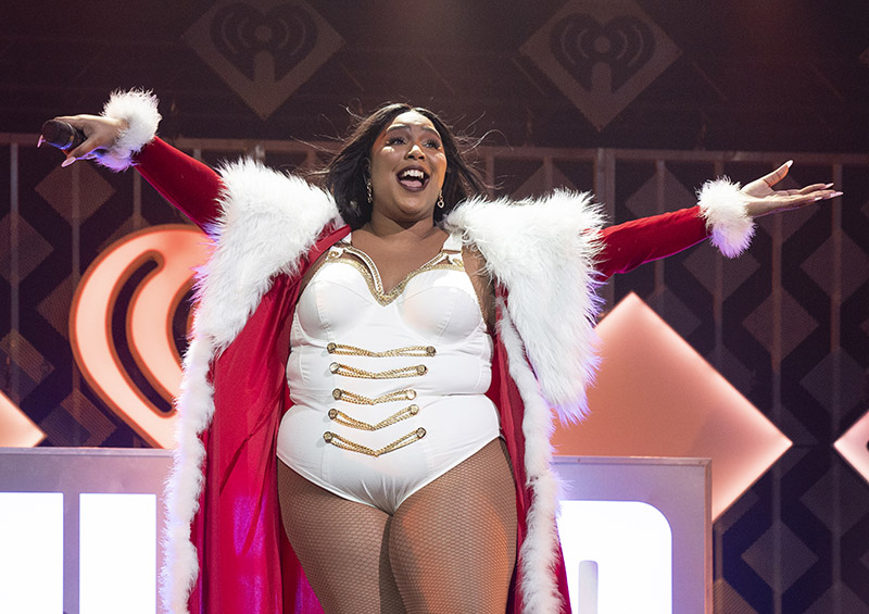 Lizzo flaunts her curves in spaghetti-strap leotard for iHeartRadio Jingle  Ball 2019 in Tampa