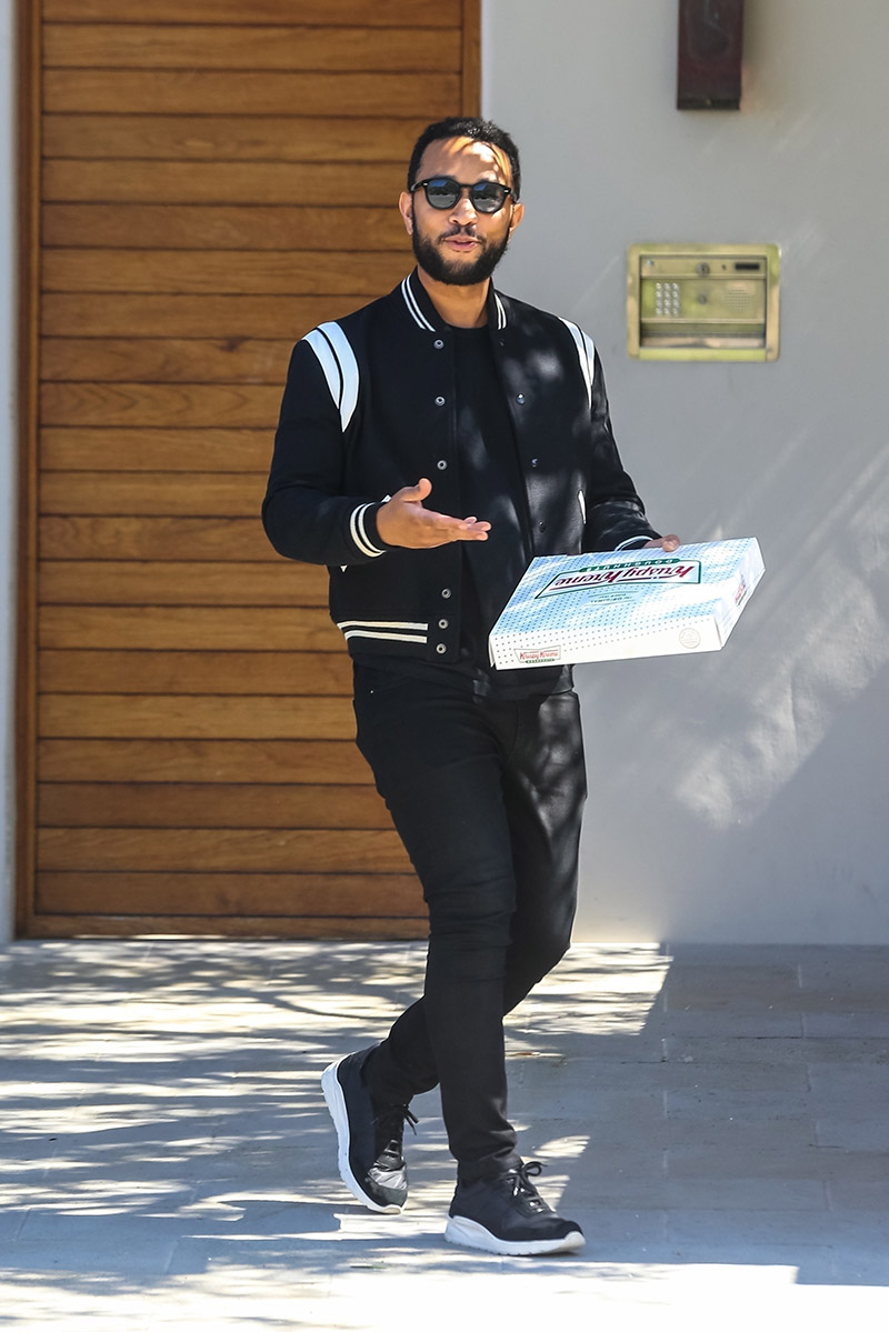 John Legend and Chrissy Teigen leave a box of Krispy Kreme donuts for ...