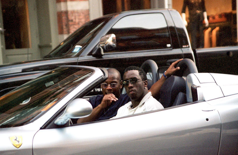 Blasting away rap music Sean Combs, better known as P. Diddy with music ...