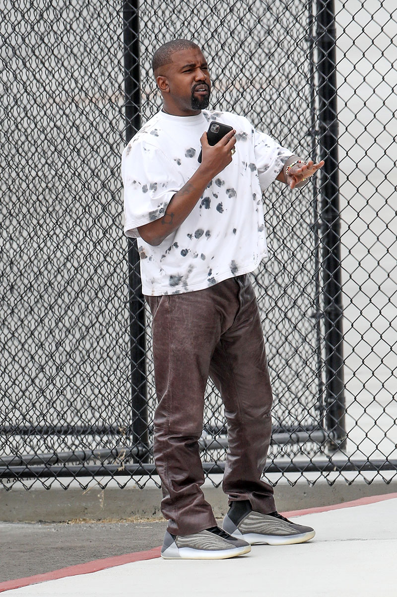 *EXCLUSIVE* Kanye West dons a new hairstyle and steps out in brown