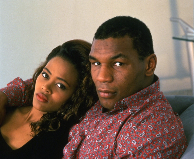 Portrait of American actress Robin Givens and her husband, heavyweight boxer Mike Tyson, as they