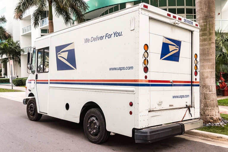 Former U.S. Postal Service employee pleads guilty to stealing cash and