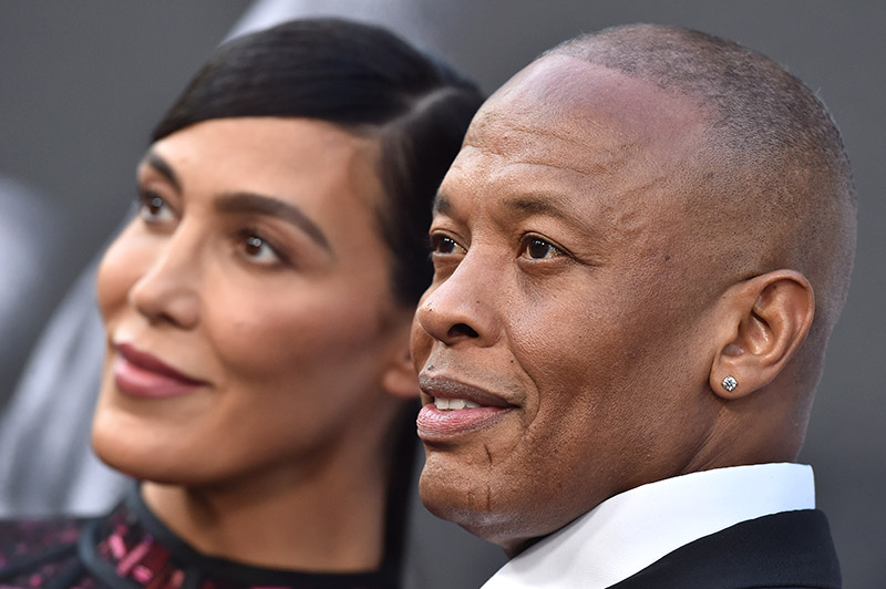 Rapper/producer Dr. Dre and wife Nicole Young arrive at the premiere of ...