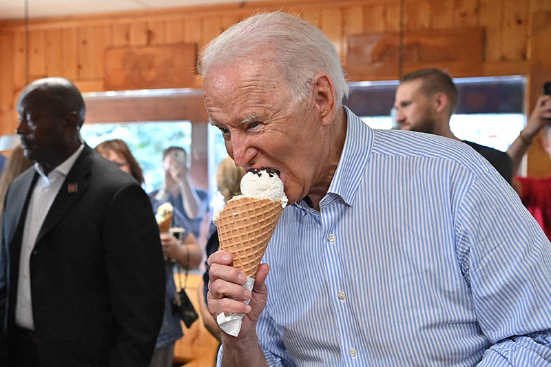 US President Joe Biden eats ice cream at Moomers Homemade Ice Cream in