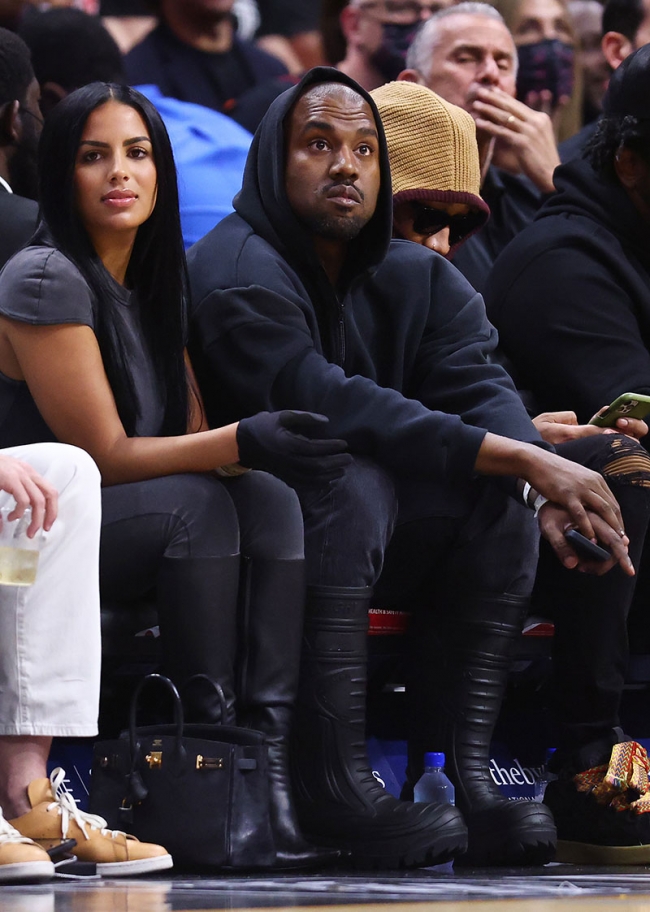 Miami, FL – Rapper Kanye West and girlfriend Chaney Jones along with ...