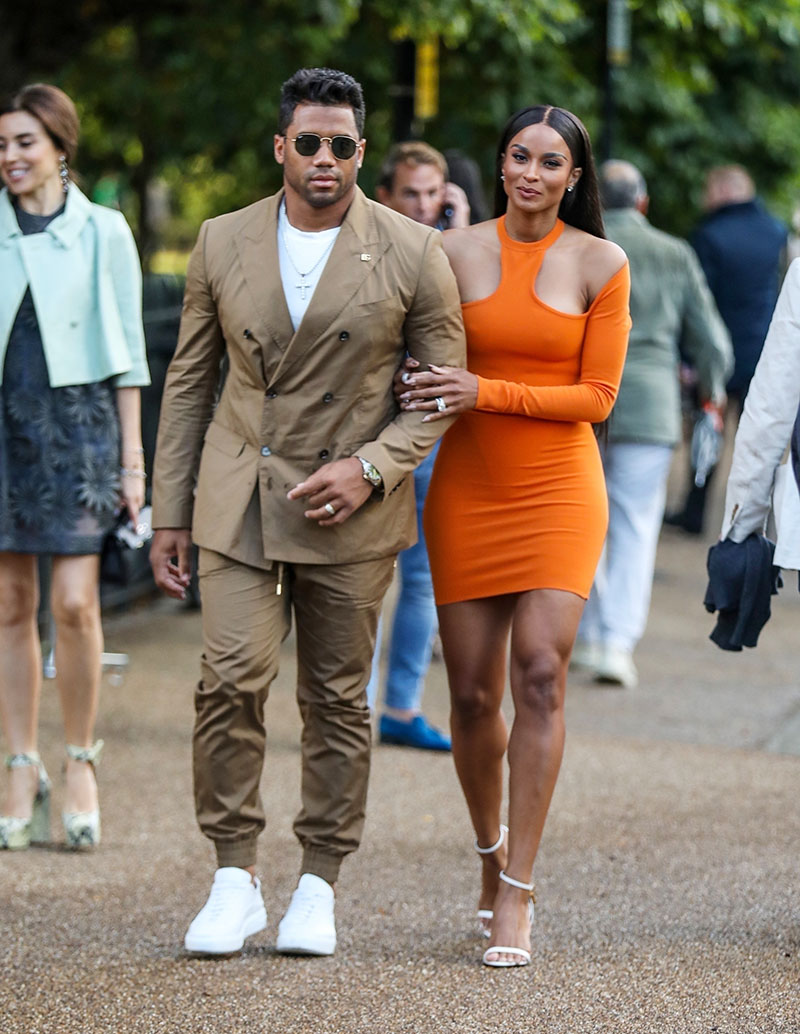 Ciara Dons Orange Cutout Dress With Russell Wilson at Serpentine