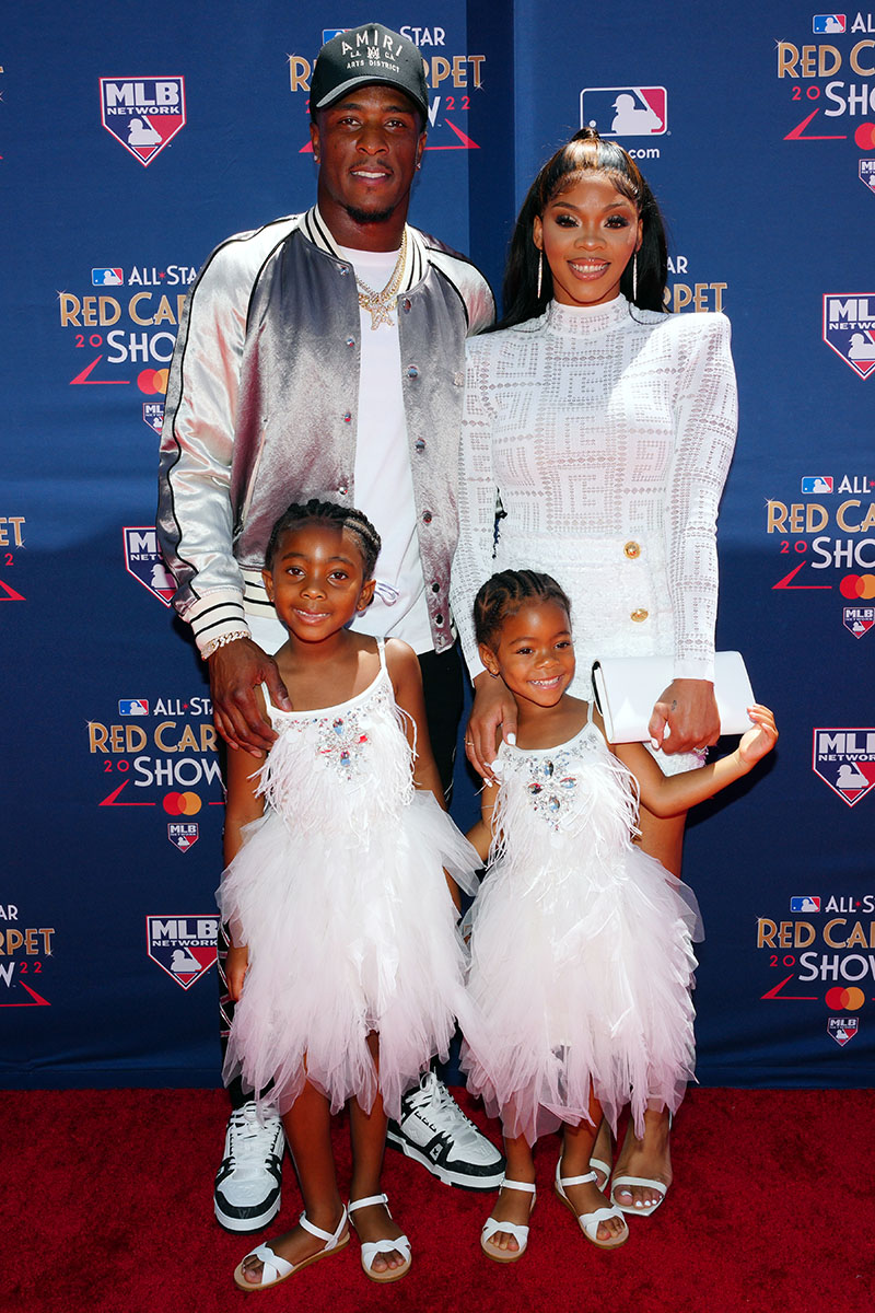 LOS ANGELES, CA – JULY 19: Tim Anderson of the Chicago White Sox poses for  a photo with family during the All-Star Red Carpet Show at L.A. Live on  Tuesday, July 19
