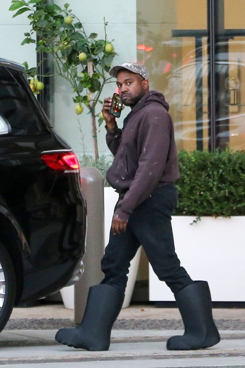 Kanye West Slips On Balenciaga Boots for Shopping With North West –  Footwear News