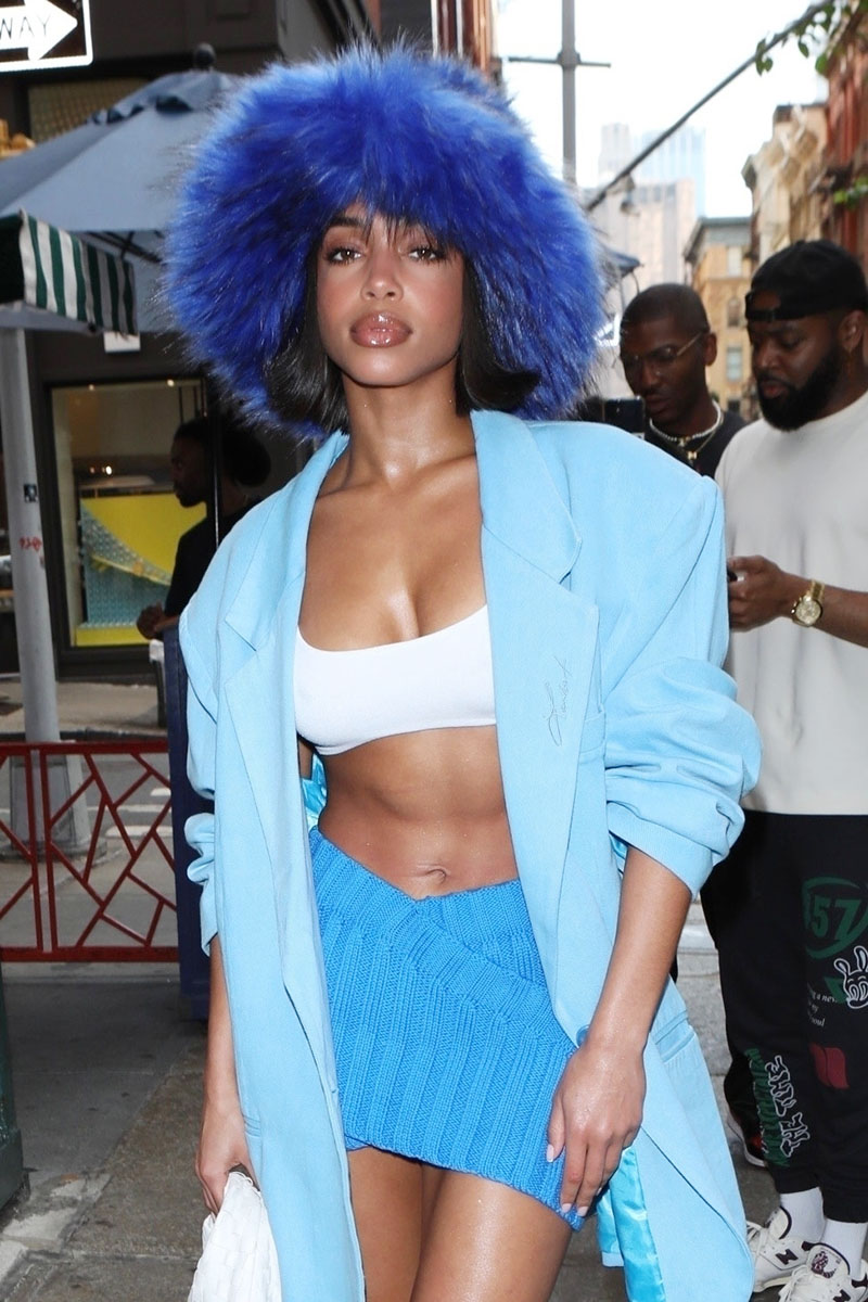 Lori Harvey Goes Sporty-Chic In Bra Top, Yankees Jacket & Sharp