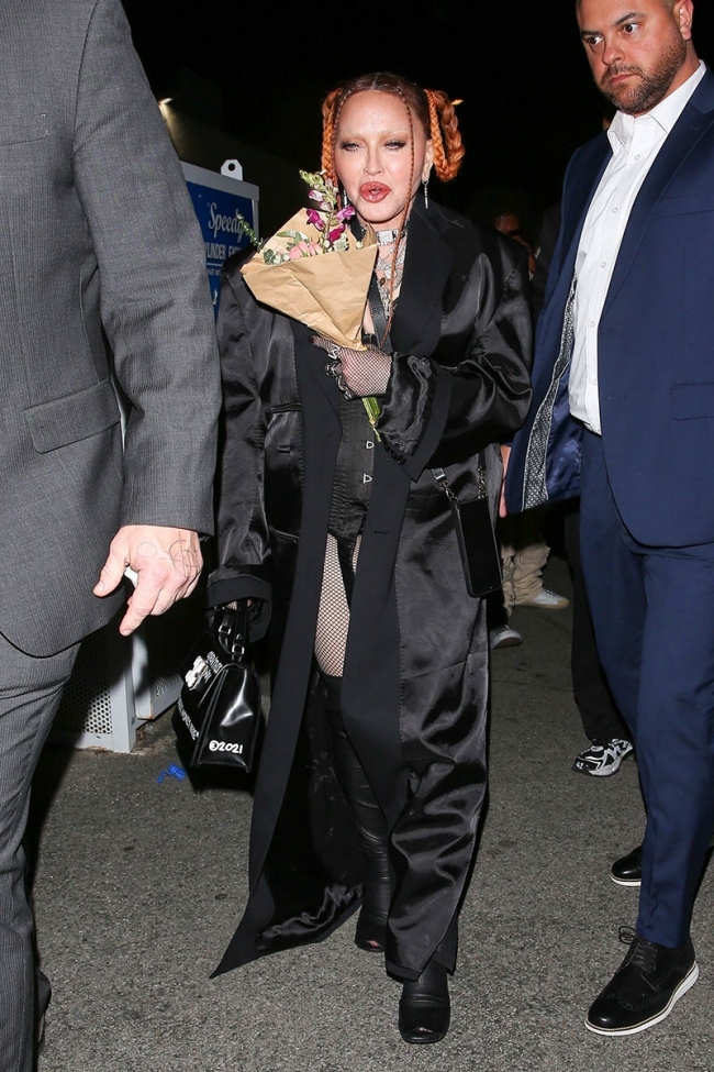 *EXCLUSIVE* Madonna was seen leaving Delilah nightclub with flowers ...