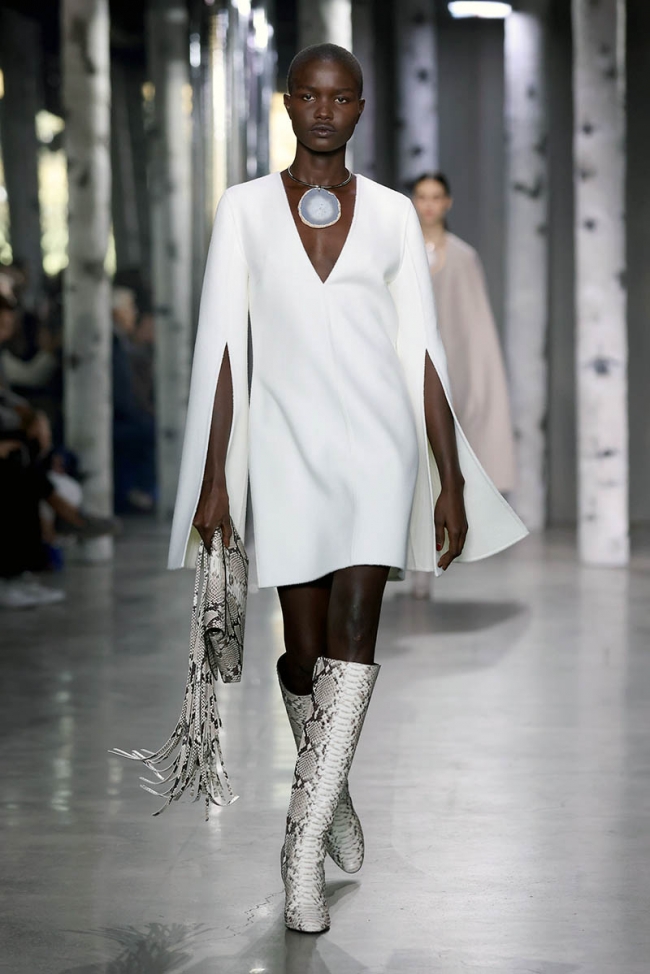 NEW YORK, NEW YORK – FEBRUARY 15: A model walks the runway during the ...