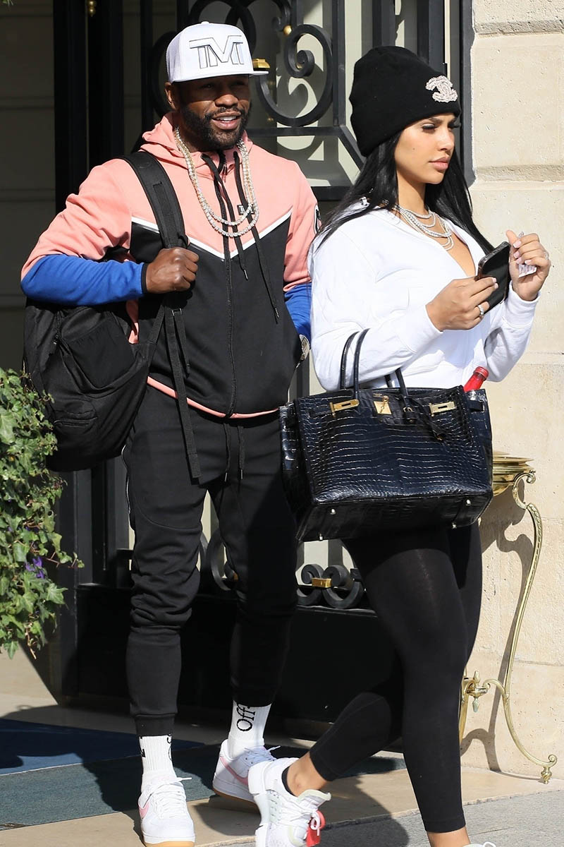 EXCLUSIVE* Floyd Mayweather, Jr. steps out with his girlfriend Gallienne  Nabila during Paris Fashion Week in Paris, France. Credit: BACKGRID