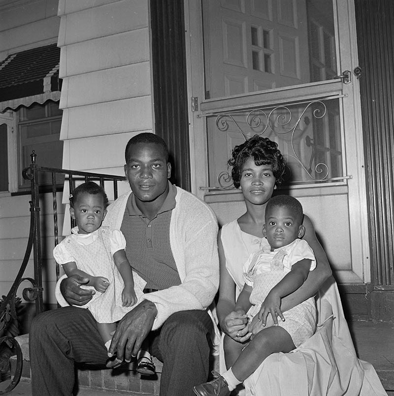 (Original Caption) Jim Brown, fullback of Cleveland Browns, sits in ...