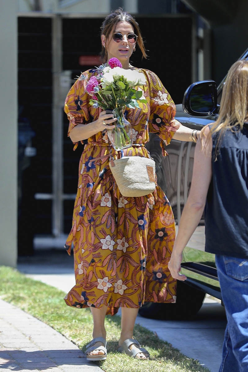 Sandra Bullock Looks So Fabulous in a Floral Dress and Basket Bag