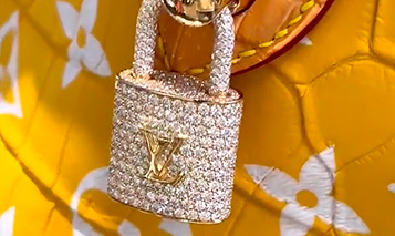 PETA Slams Pharrell Williams' Crocodile Skin Louis Vuitton Handbag
