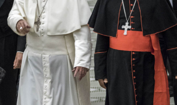 PAUL VI HALL, VATICAN CITY, VATICAN – 2016/11/05: Pope Francis and Cardinal Peter Kodwo Appiah Turkson (R) attend an audience with representatives of Third World Meeting of Popular Movements in Paul VI hall in Vatican City, Vatican. The Meeting brings together organizations of people on the margins of society, including the poor, the unemployed and those who have lost their agricultural land. (Photo by Giuseppe Ciccia/Pacific Press/LightRocket via Getty Images)
