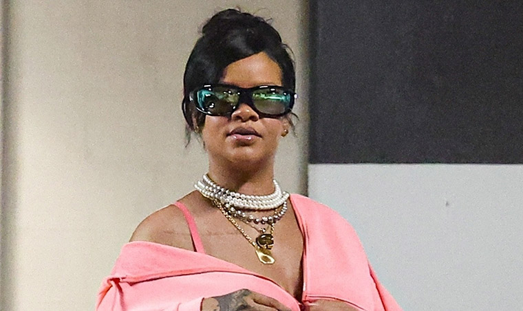 Rihanna rocks a baby bump-baring pink hoodie in Beverly Hills