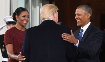 TOPSHOT – President-elect Donald Trump(C)is greeted by US President Barack Obama and First Lady Michelle Obama(L) as he arrives at the White House in Washington, DC January 20, 2017.  / AFP / JIM WATSON        (Photo credit should read JIM WATSON/AFP via Getty Images)