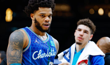 ATLANTA, GA – APRIL 13: Miles Bridges #0 of the Charlotte Hornets is restrained after being ejected from the game during the second half against the Atlanta Hawks at State Farm Arena on April 13, 2022 in Atlanta, Georgia. NOTE TO USER: User expressly acknowledges and agrees that, by downloading and or using this photograph, User is consenting to the terms and conditions of the Getty Images License Agreement. (Photo by Todd Kirkland/Getty Images)