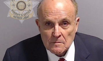 Rudy Giuliani’s mugshot released after he surrendered at Georgia jail in August 2023. He posed for this official booking photo after turning himself into the Atlanta facility on charges related to efforts to overturn then-President Donald Trump’s loss in the 2020 presidential election in Georgia. Photo credit: Fulton County Sheriff/MEGA